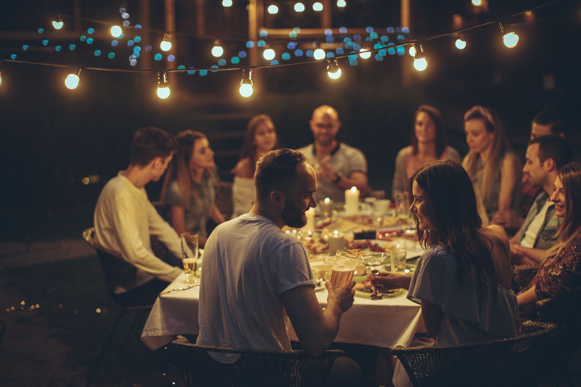 Three friends at a table. One secret between all of us.